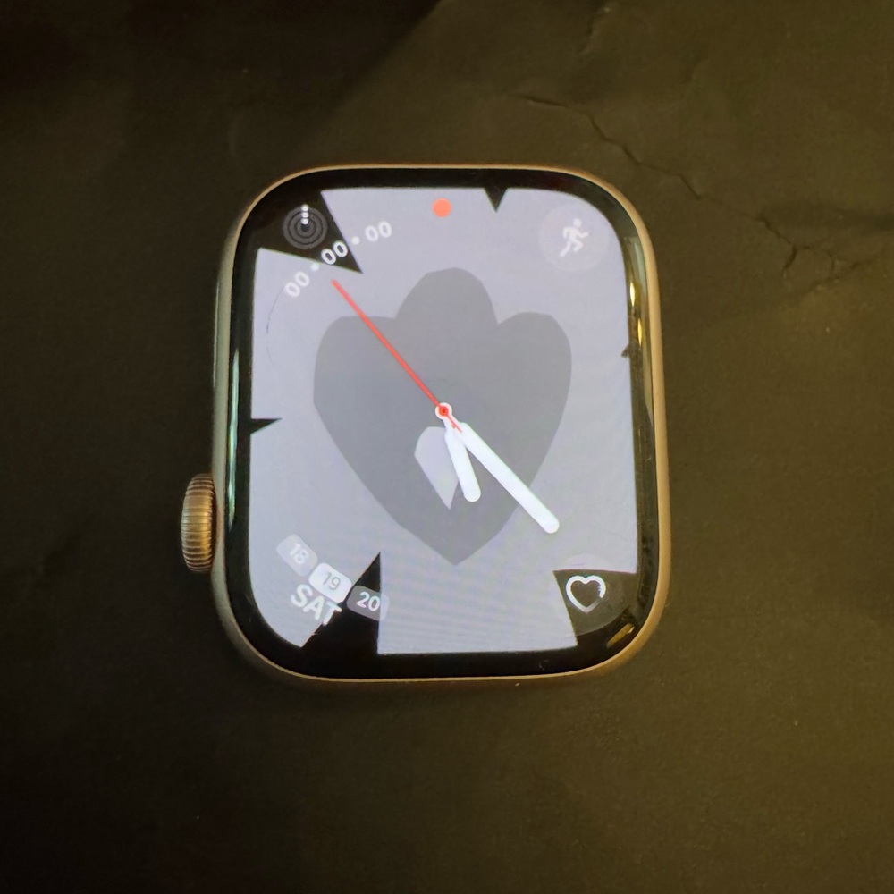 Pink 41mm gen 9 Apple Watch with 6 apple bands